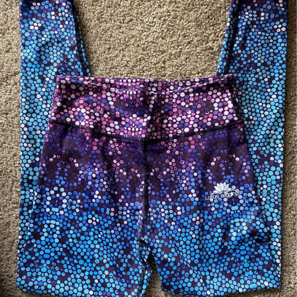 Eight pairs of women's size small leggings